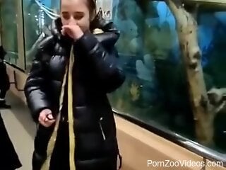 Clothed female visits the zoo where she starts to crave animal...