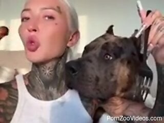 Blonde Russian beauty and her dog share live moments together