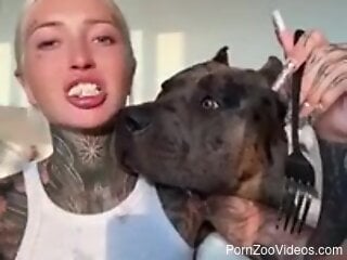 Blonde Russian beauty and her dog share live moments together