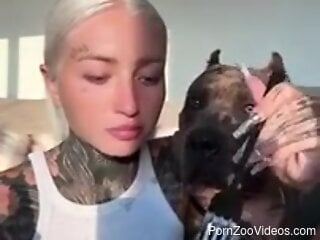 Blonde Russian beauty and her dog share live moments together