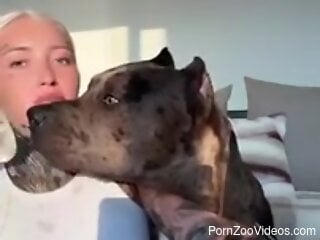 Blonde Russian beauty and her dog share live moments together