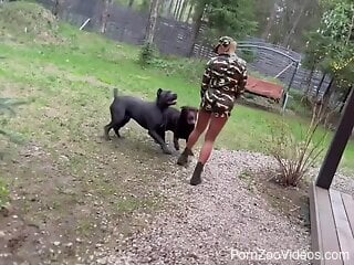 Russian slut is eager to strip naked and fuck with her dogs